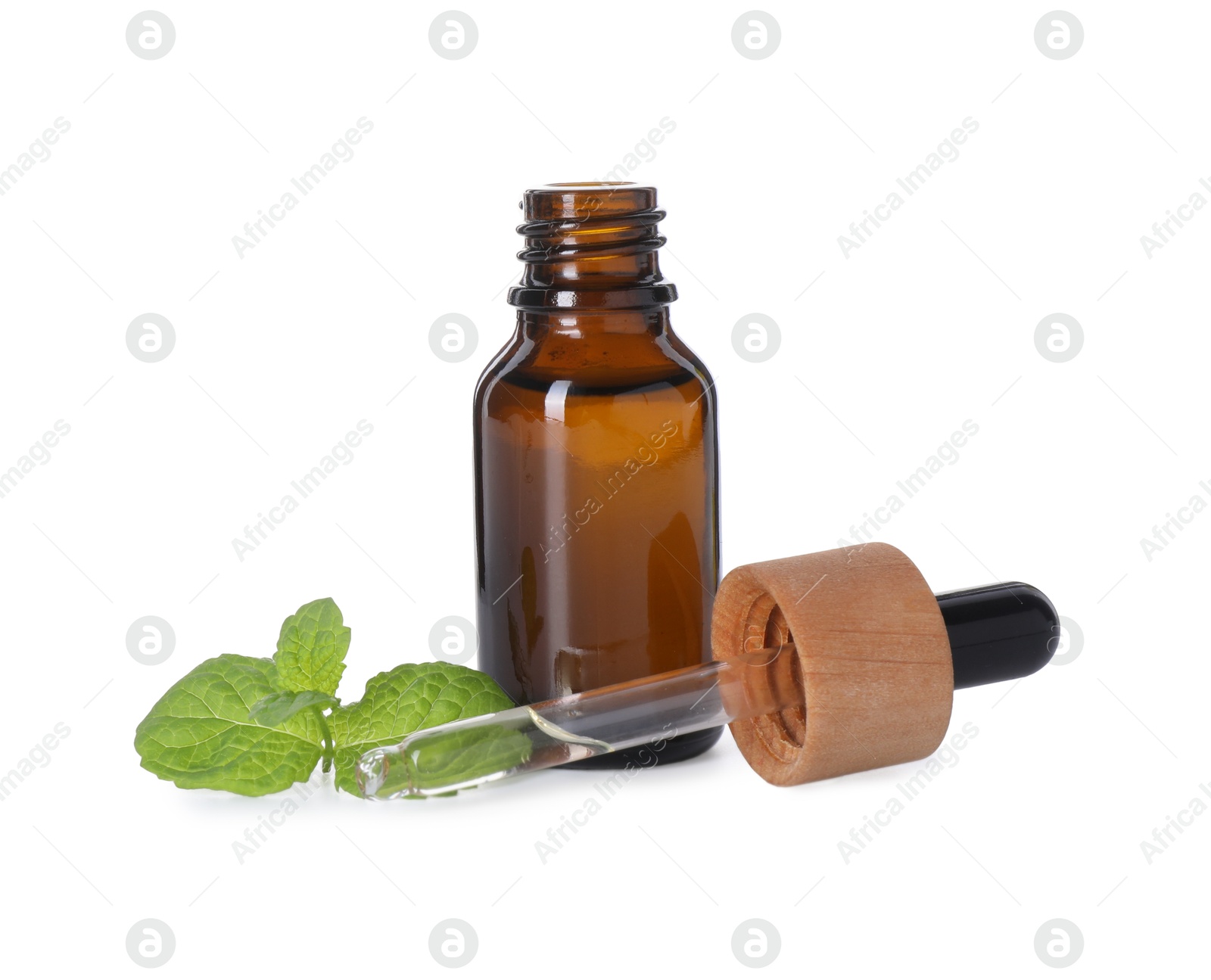 Photo of Bottle of essential oil, dropper and mint isolated on white