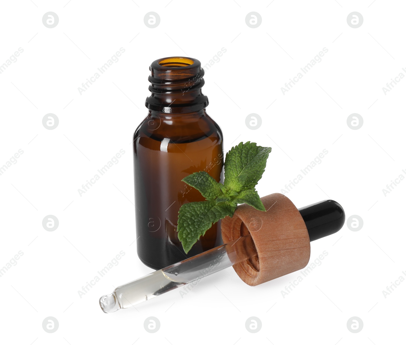 Photo of Bottle of essential oil, dropper and mint isolated on white