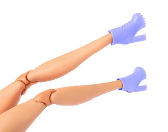 Image of Doll's legs with fancy boots on white background