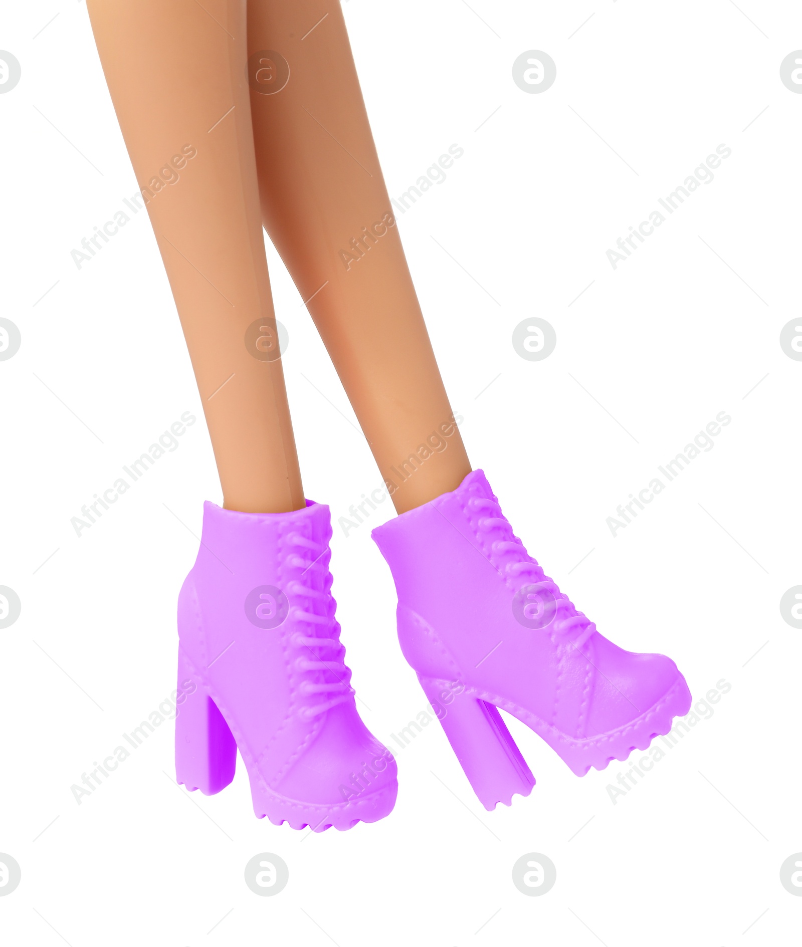 Image of Doll's legs with fancy boots on white background