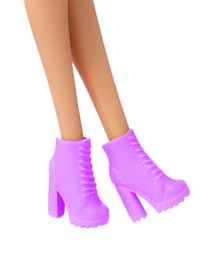 Image of Doll's legs with fancy boots on white background