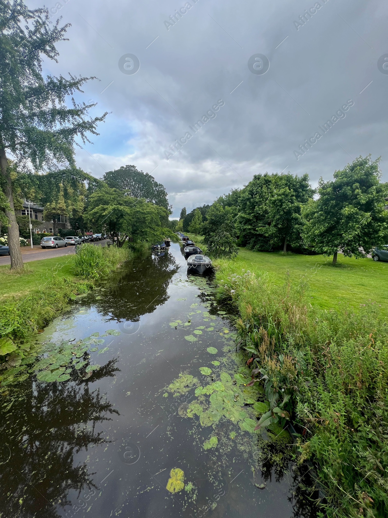 Photo of Picturesque view of canal with moored boats