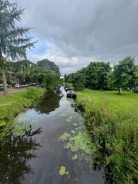 Picturesque view of canal with moored boats