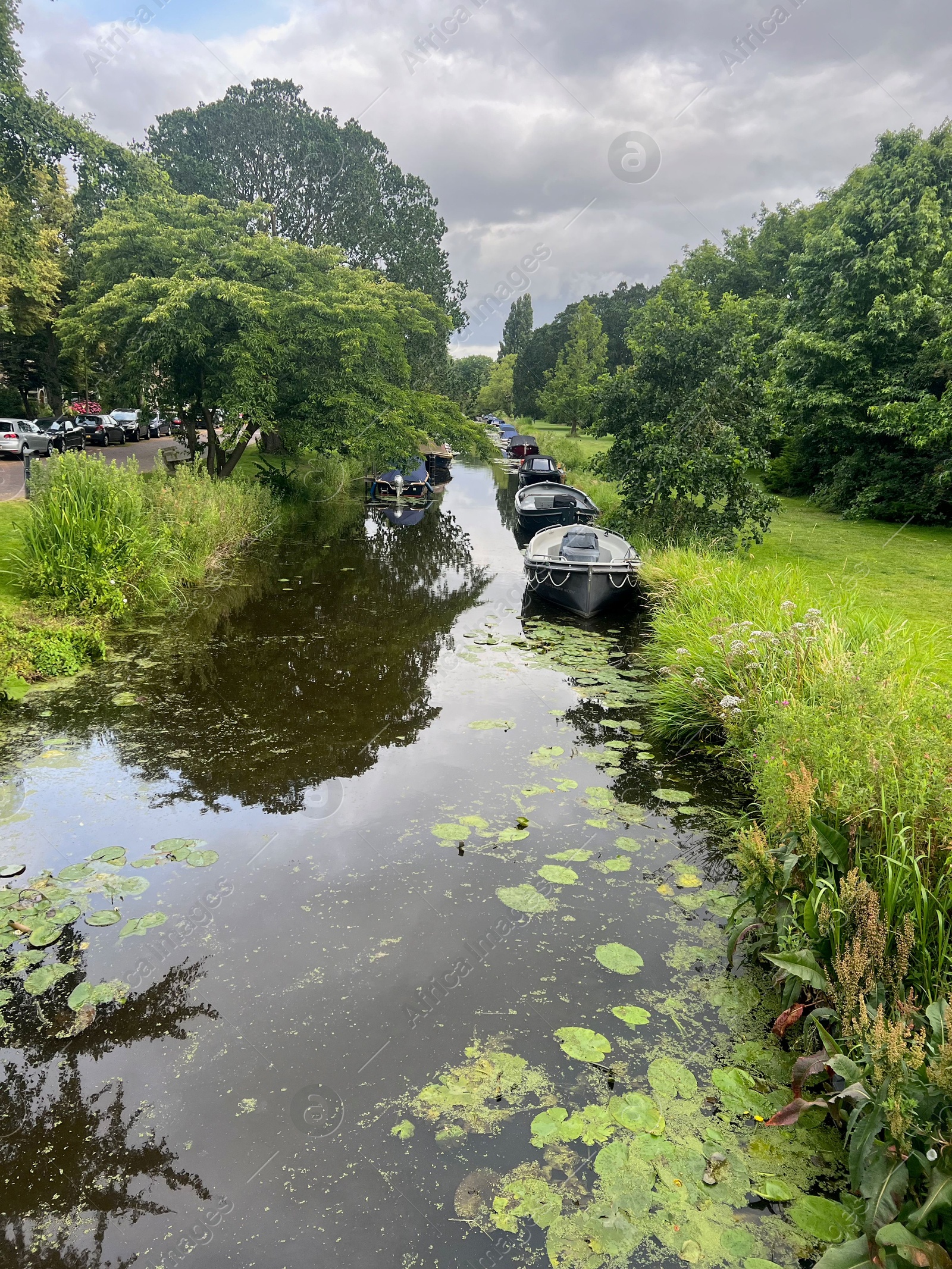 Photo of Picturesque view of canal with moored boats