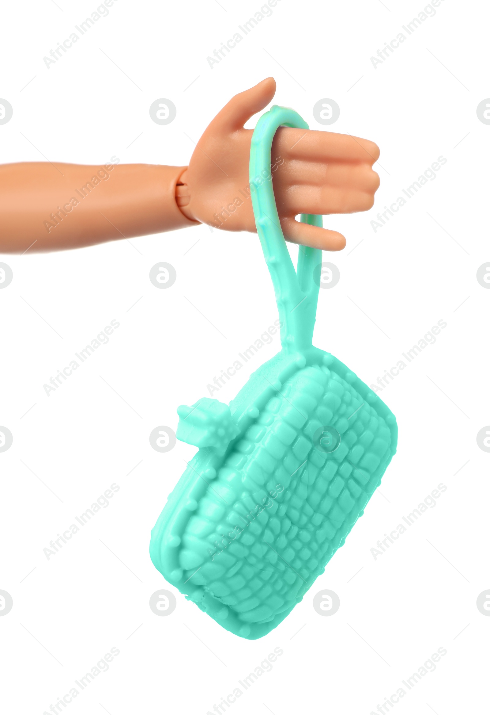 Image of Doll's hand with fancy bag on white background