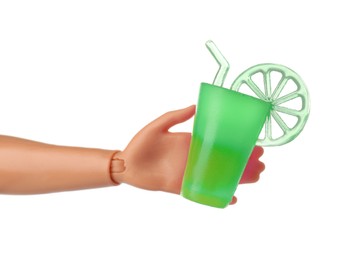 Image of Doll's hand with glass of lemonade on white background