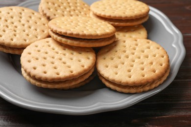 Fresh tasty sandwich cookies on table, closeup