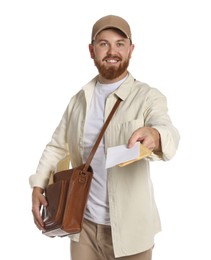 Photo of Happy young postman with brown bag delivering letters on white background