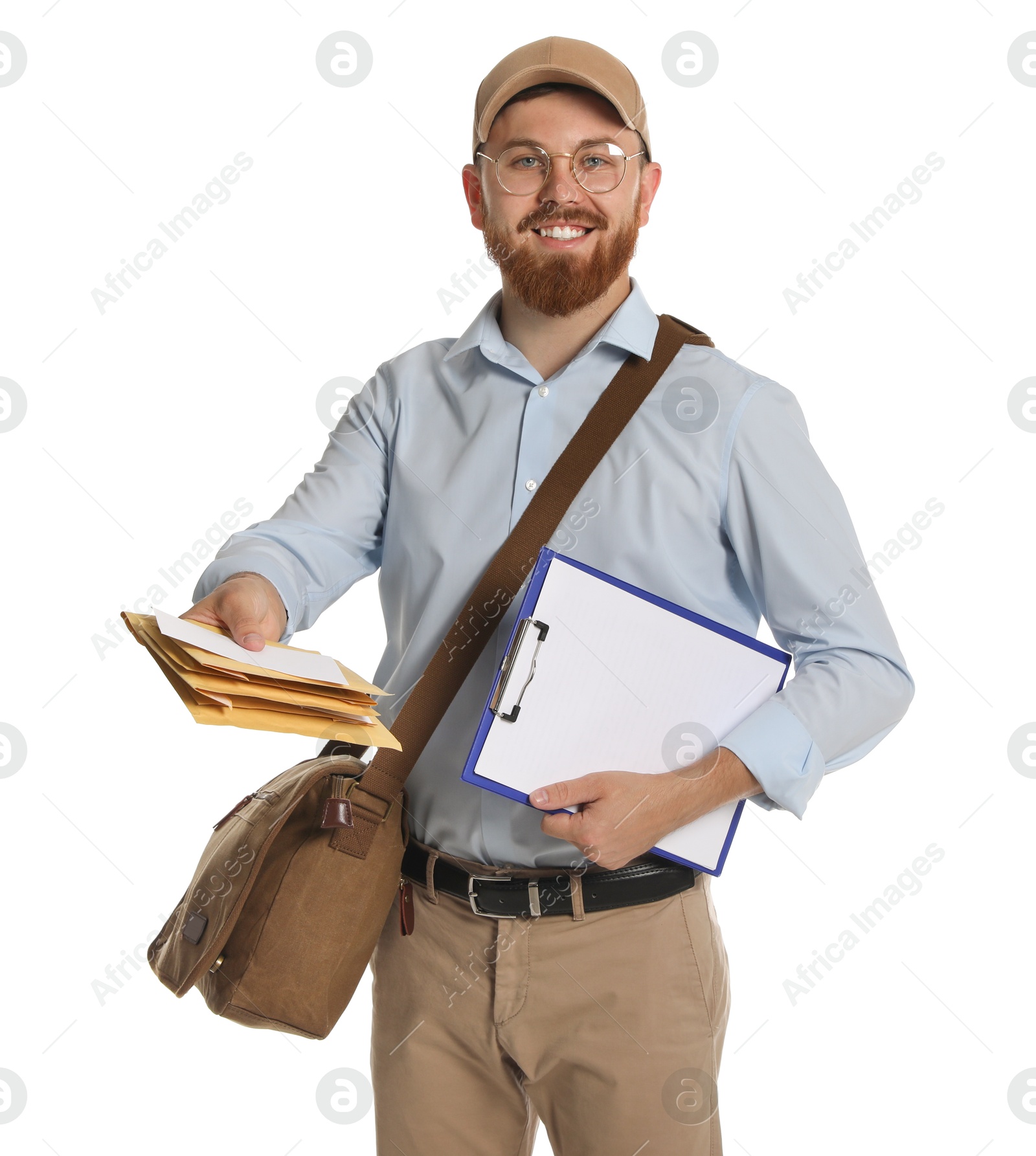 Photo of Happy young postman with brown bag delivering letters on white background