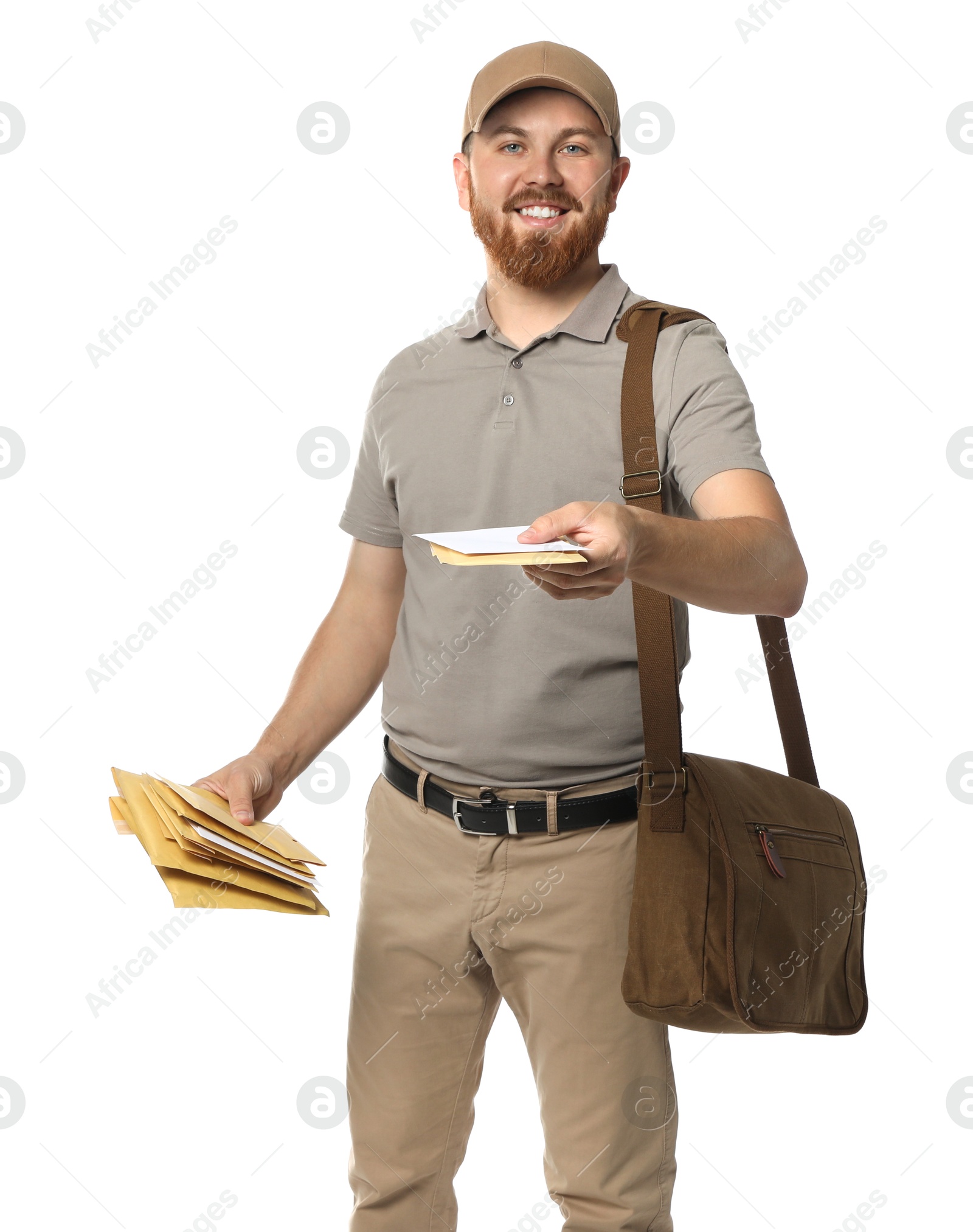 Photo of Happy young postman with brown bag delivering letters on white background