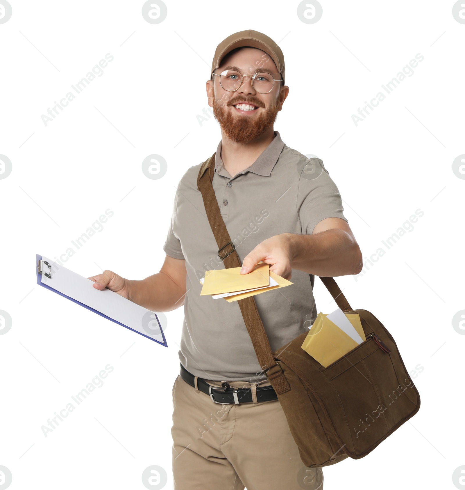 Photo of Happy young postman with brown bag delivering letters on white background