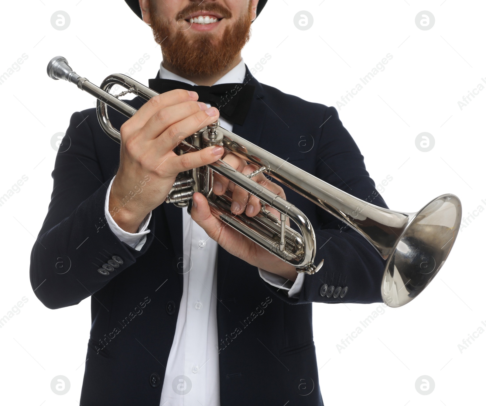 Photo of Smiling musician with trumpet on white background, closeup