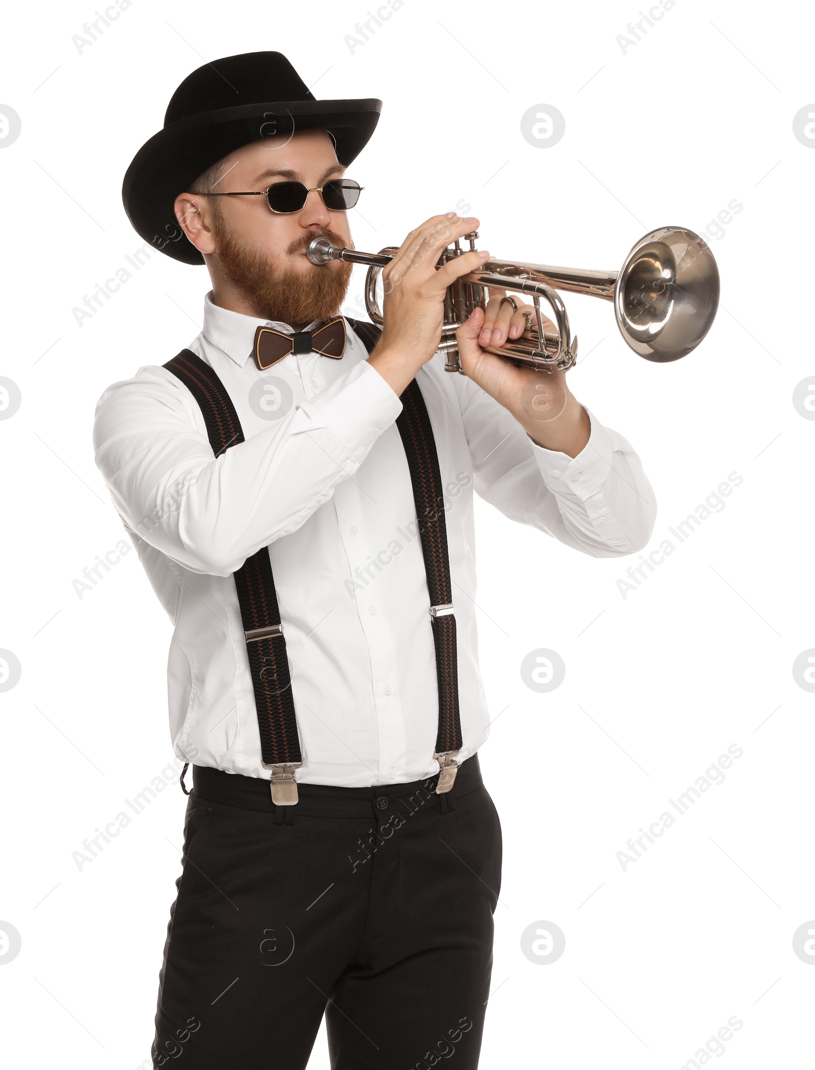 Photo of Handsome musician playing trumpet on white background