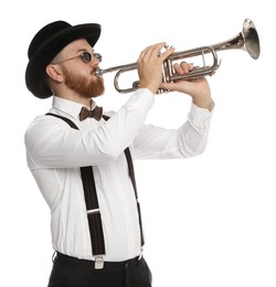 Handsome musician playing trumpet on white background