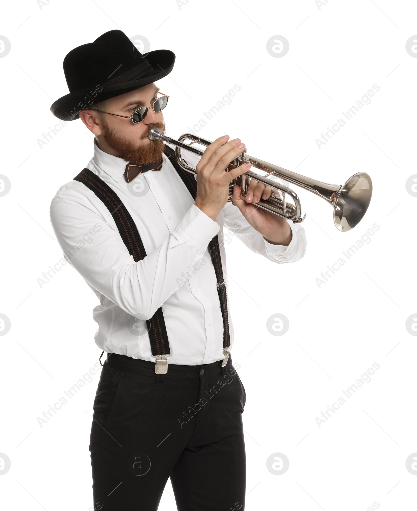 Photo of Handsome musician playing trumpet on white background