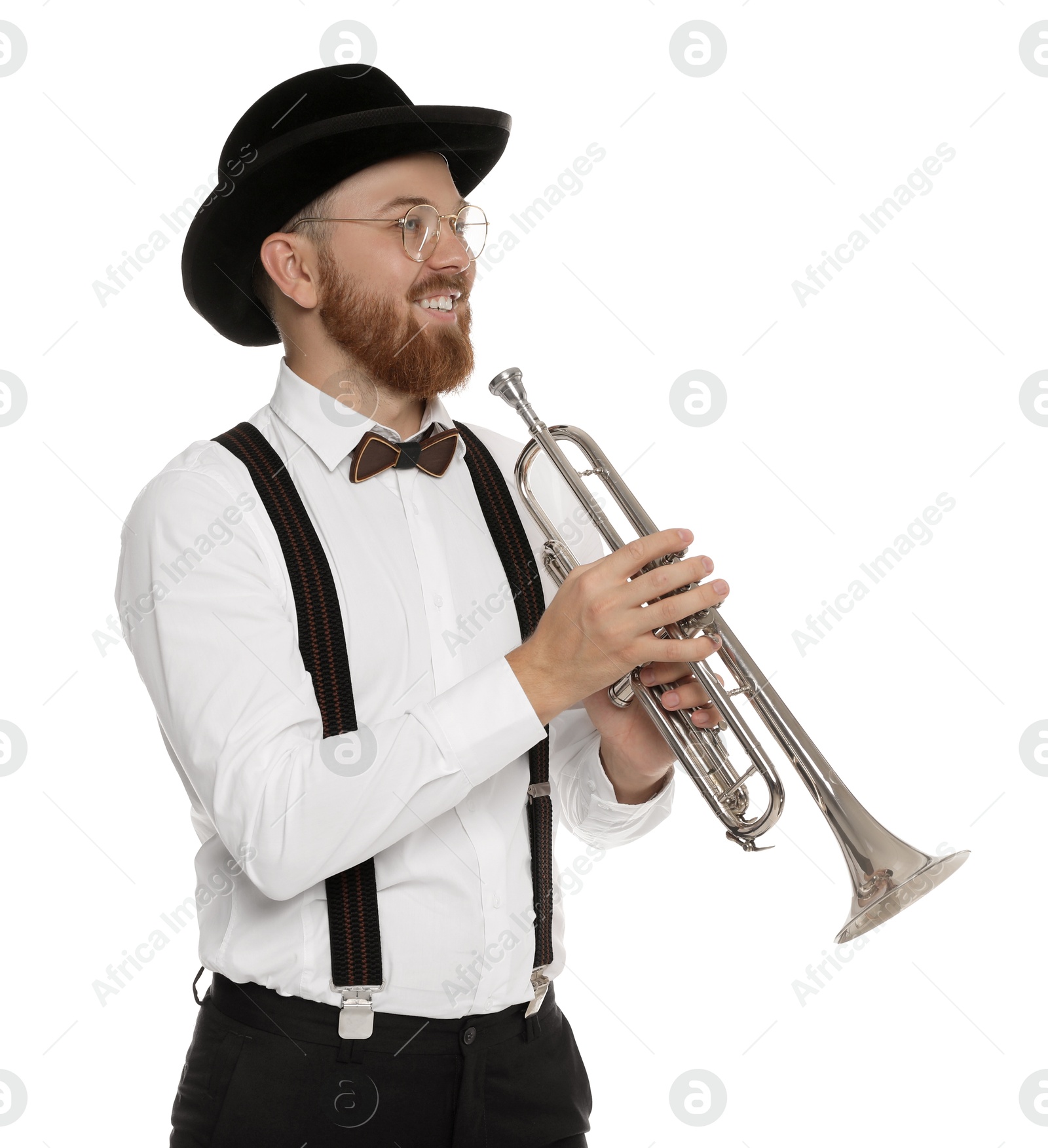 Photo of Smiling musician with trumpet on white background