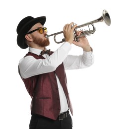 Handsome musician playing trumpet on white background