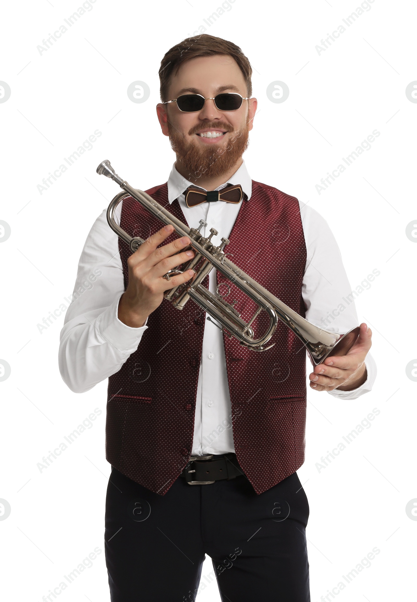 Photo of Smiling musician with trumpet on white background