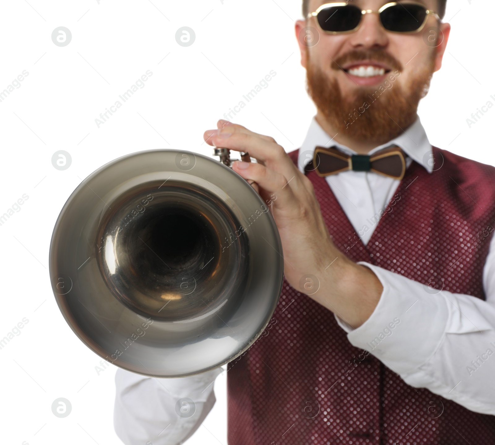 Photo of Smiling musician with trumpet on white background, selective focus