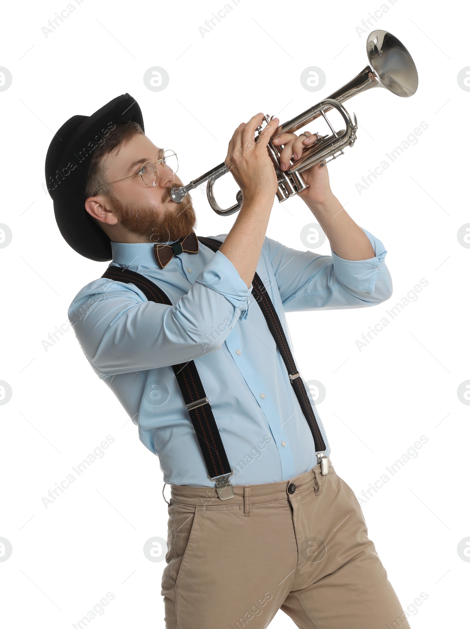 Photo of Handsome musician playing trumpet on white background