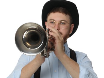 Handsome musician playing trumpet on white background