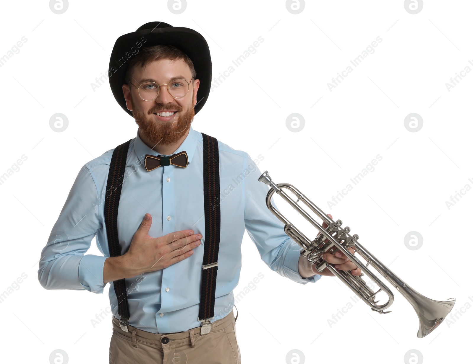 Photo of Smiling musician with trumpet on white background