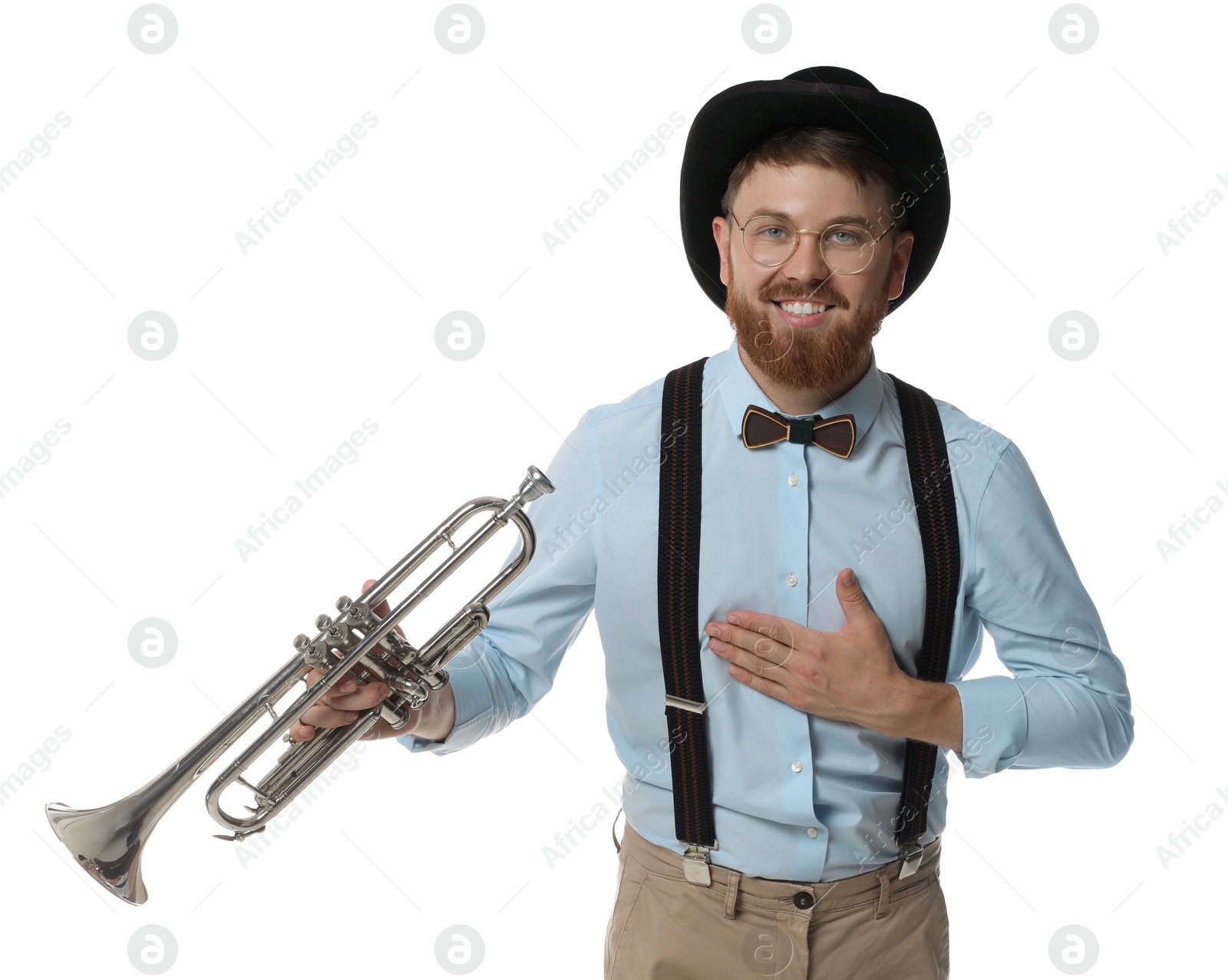 Photo of Smiling musician with trumpet on white background