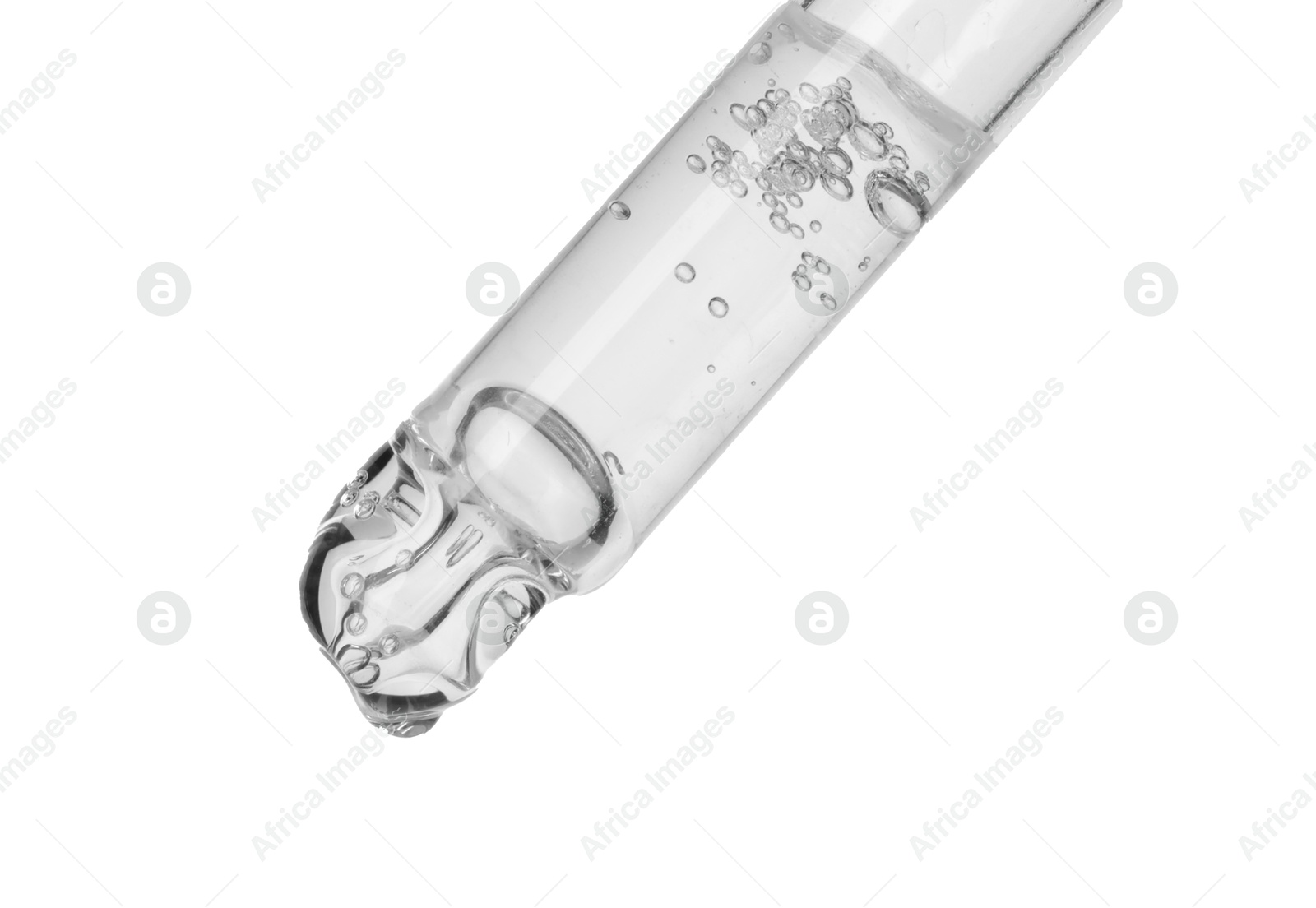 Photo of Dripping cosmetic serum from pipette on white background