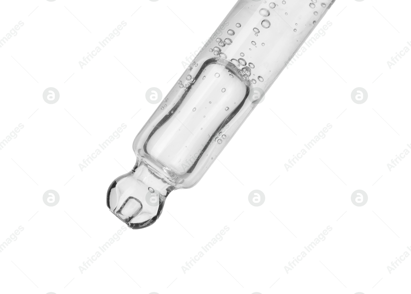 Photo of Dripping cosmetic serum from pipette on white background