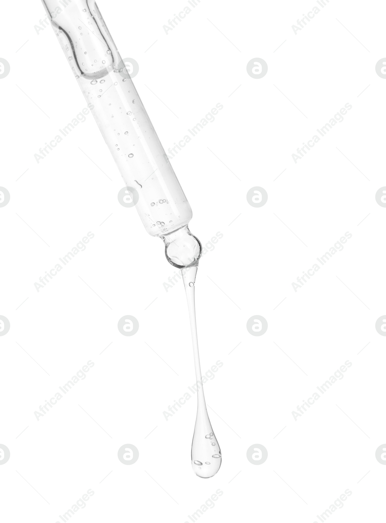 Photo of Dripping cosmetic serum from pipette on white background