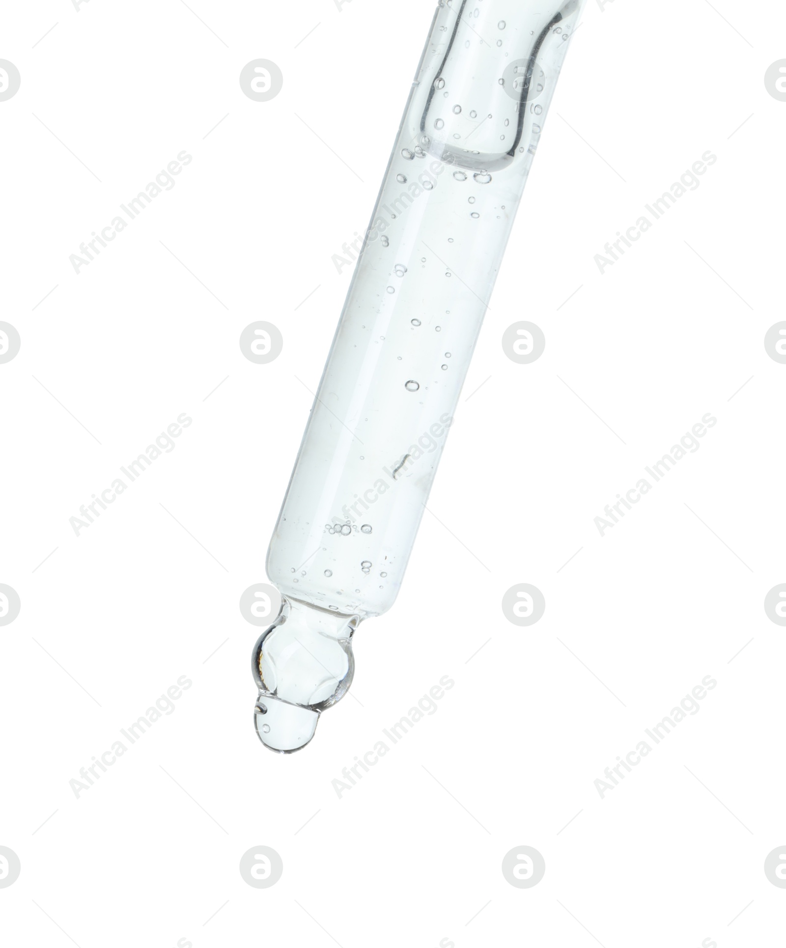 Photo of Dripping cosmetic serum from pipette on white background