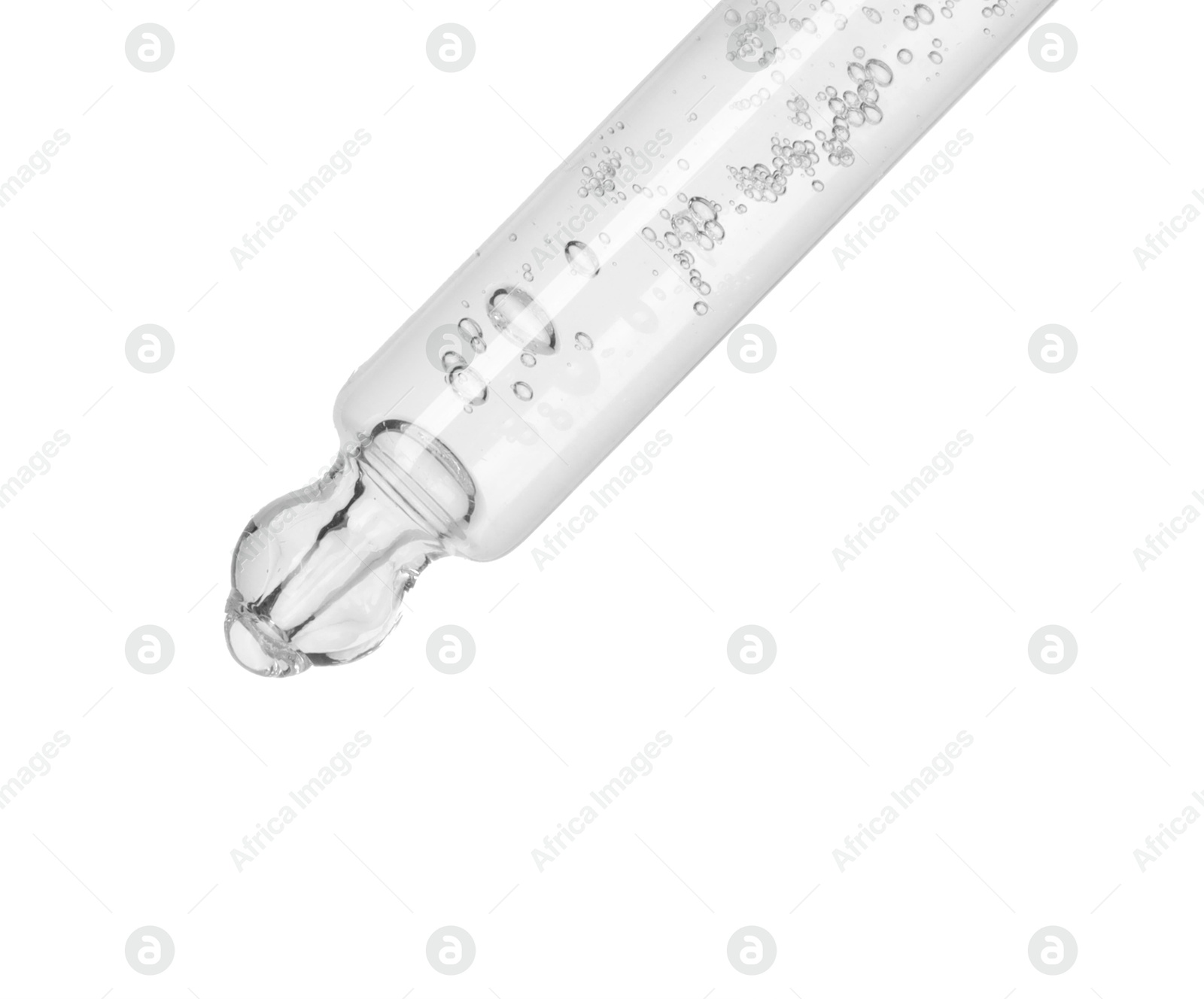 Photo of Dripping cosmetic serum from pipette on white background