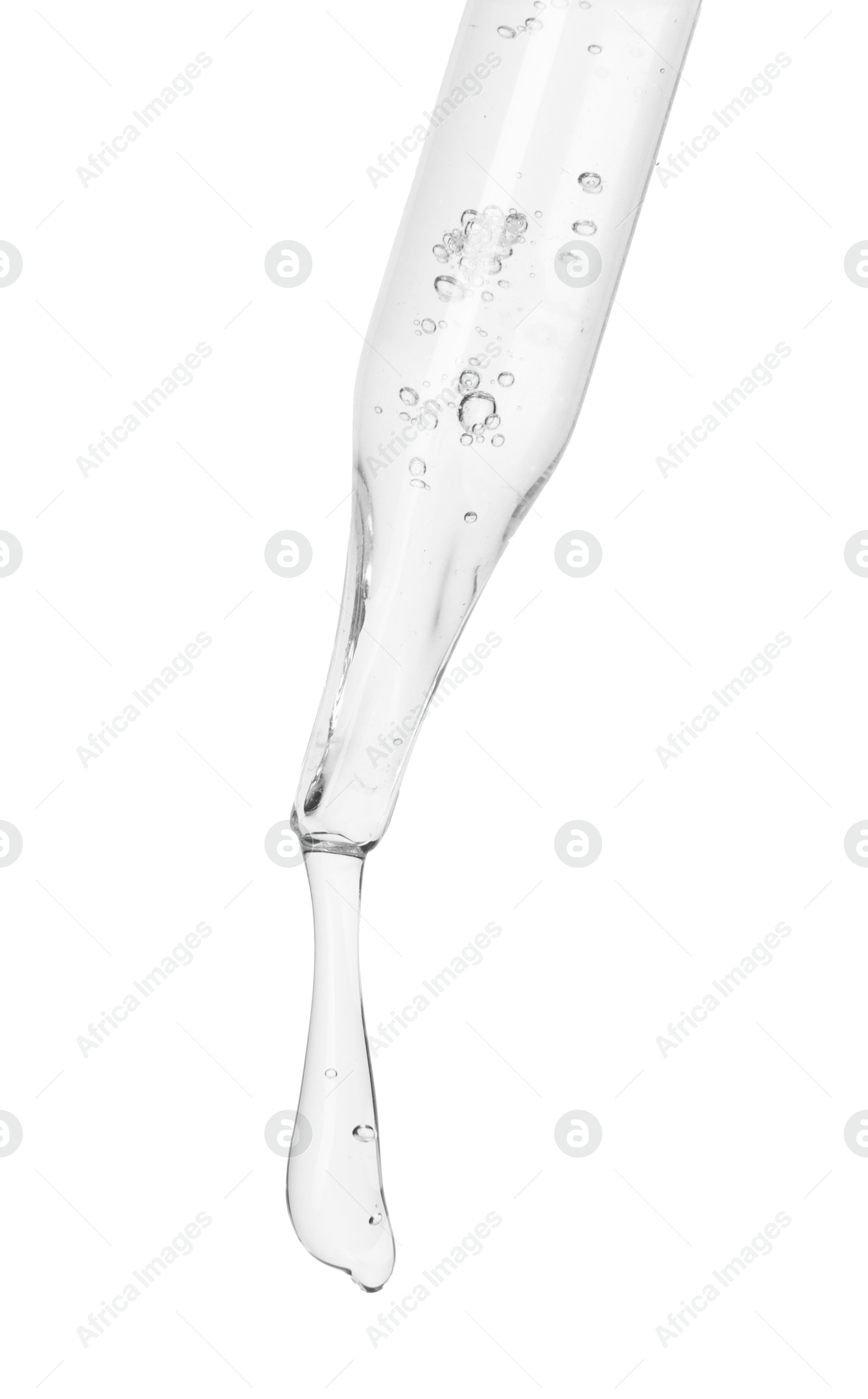 Photo of Dripping cosmetic serum from pipette on white background