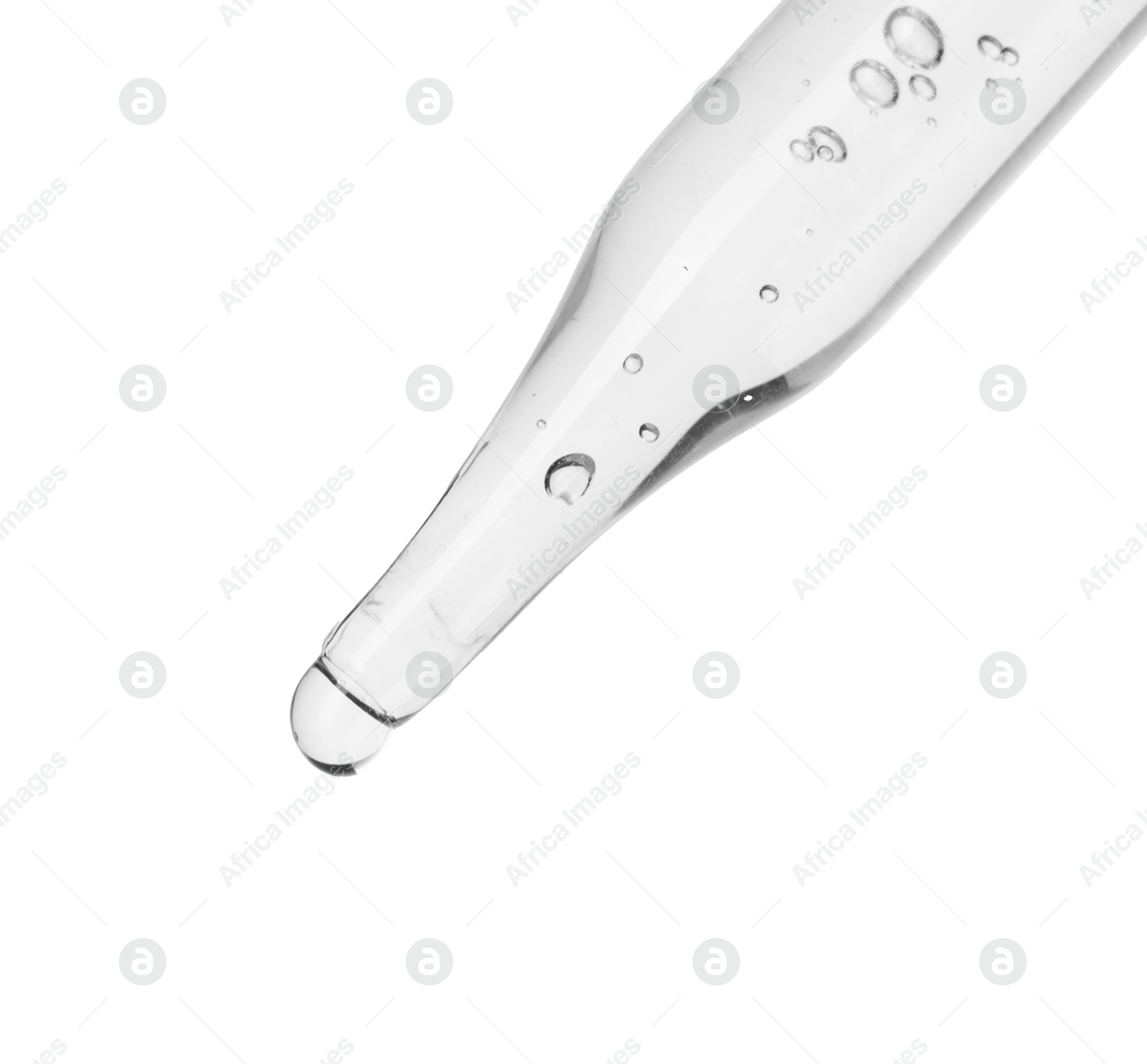 Photo of Dripping cosmetic serum from pipette on white background