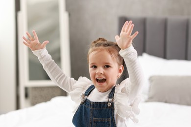 Photo of Portrait of emotional little girl indoors. Cute child