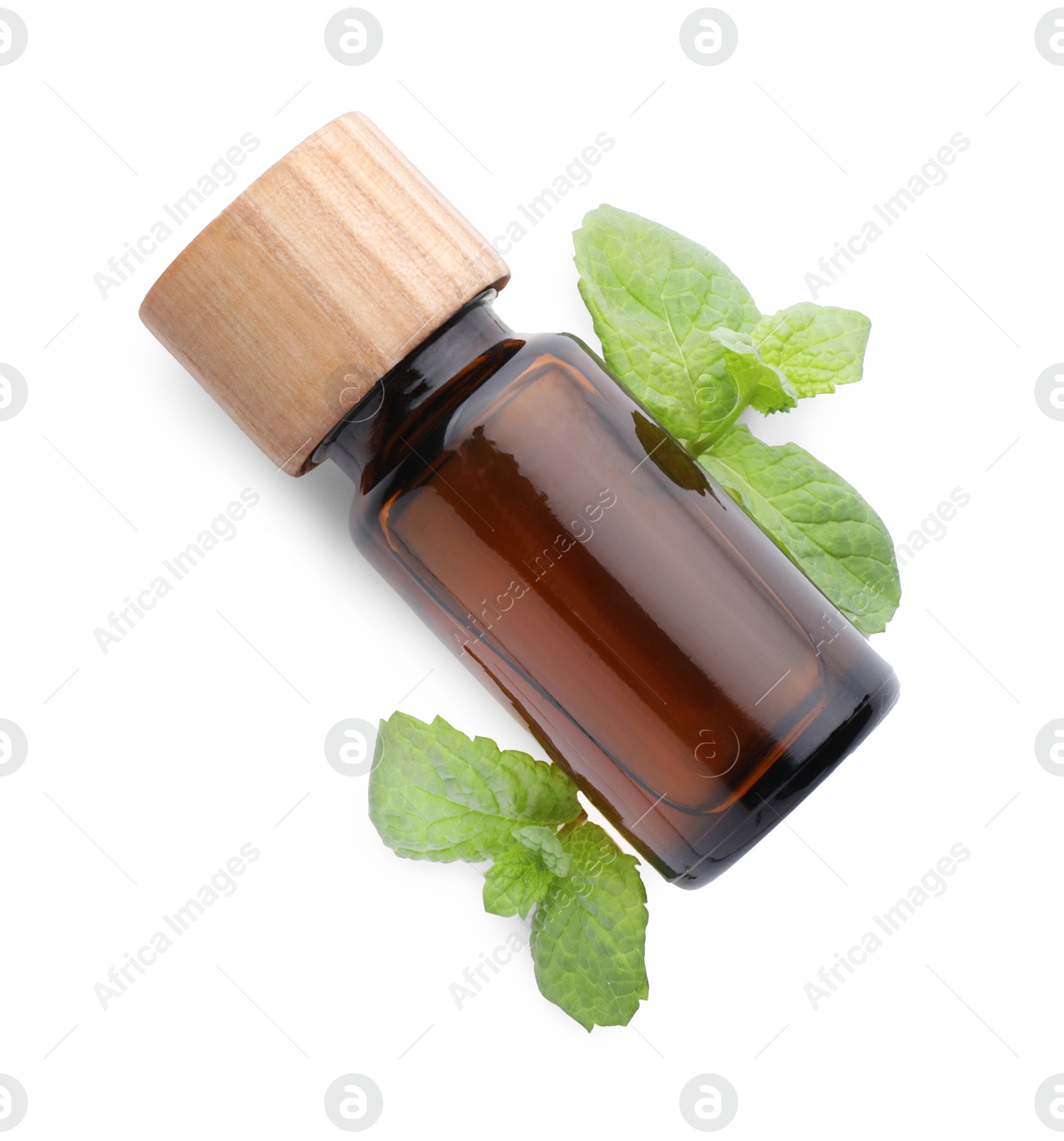 Photo of Bottle of essential oil and mint isolated on white, top view