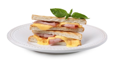 Pieces of toasted bread with melted cheese, ham and basil isolated on white