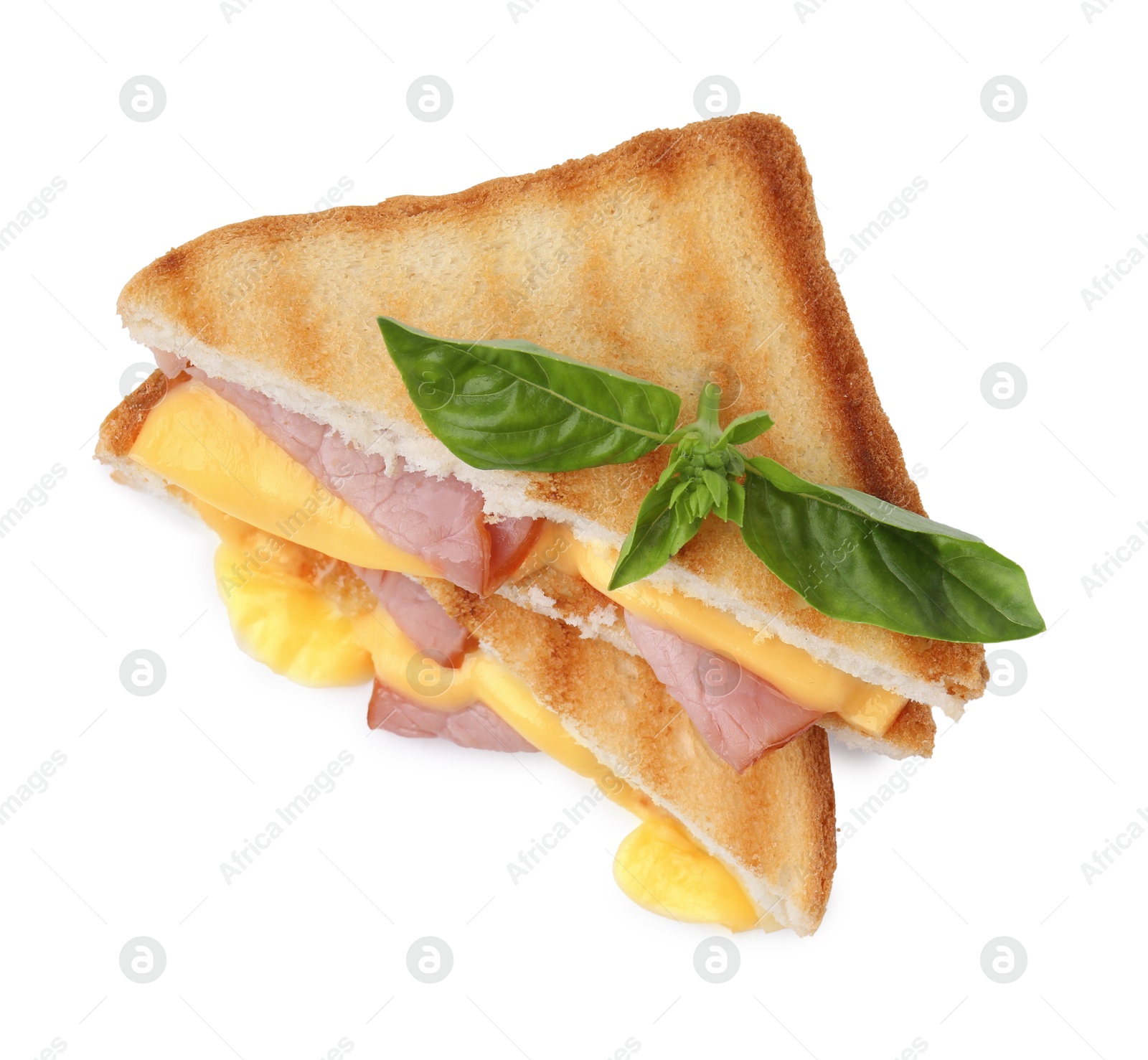 Photo of Pieces of toasted bread with melted cheese, ham and basil isolated on white, top view