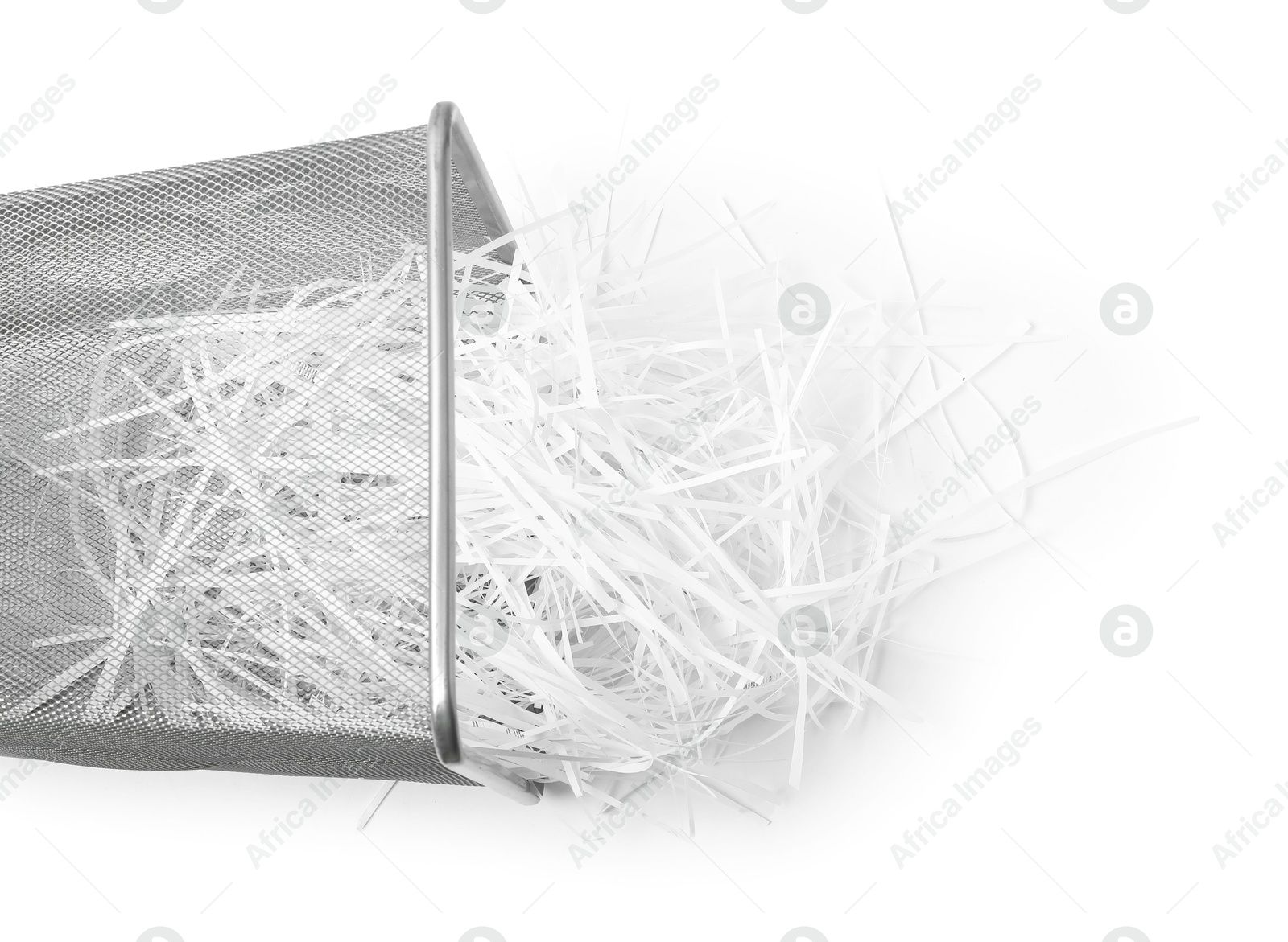 Photo of Metal basket and shredded paper isolated on white, top view