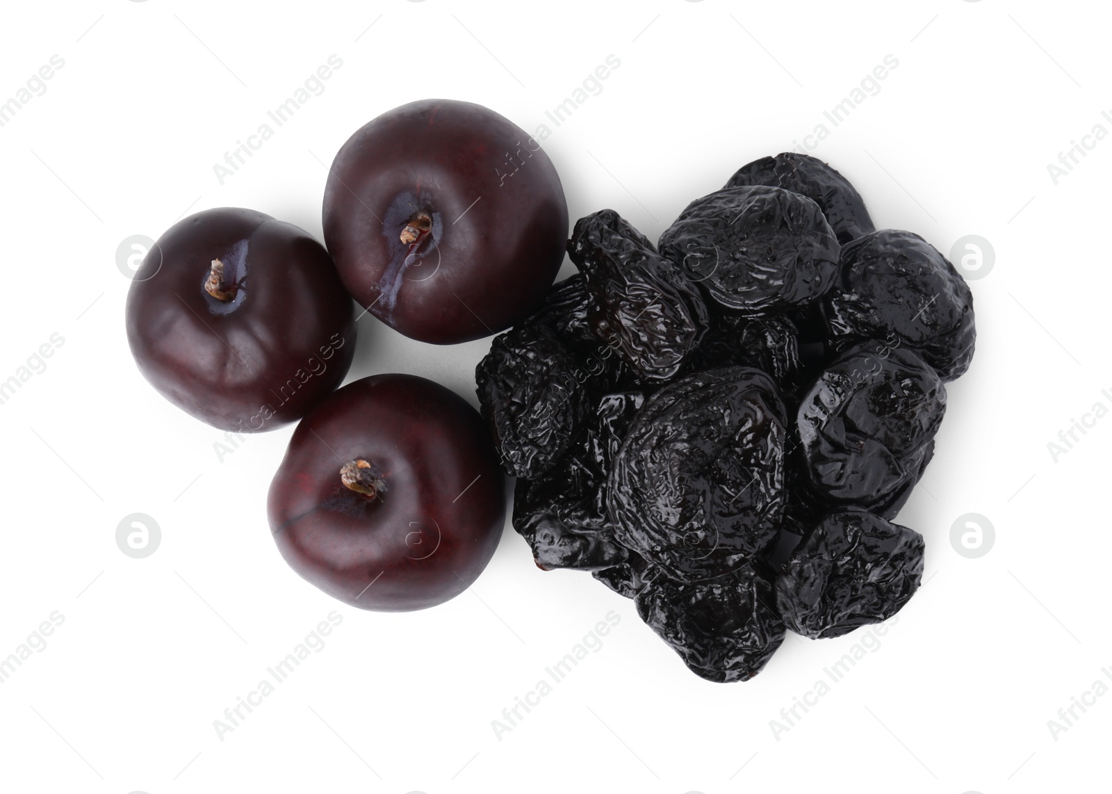 Photo of Delicious prunes and fresh ripe plums isolated on white, top view