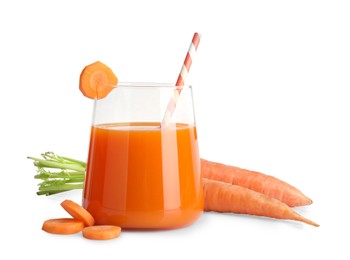 Photo of Healthy carrot juice in glass and fresh vegetables isolated on white