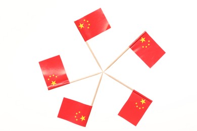 Small paper flags of China isolated on white