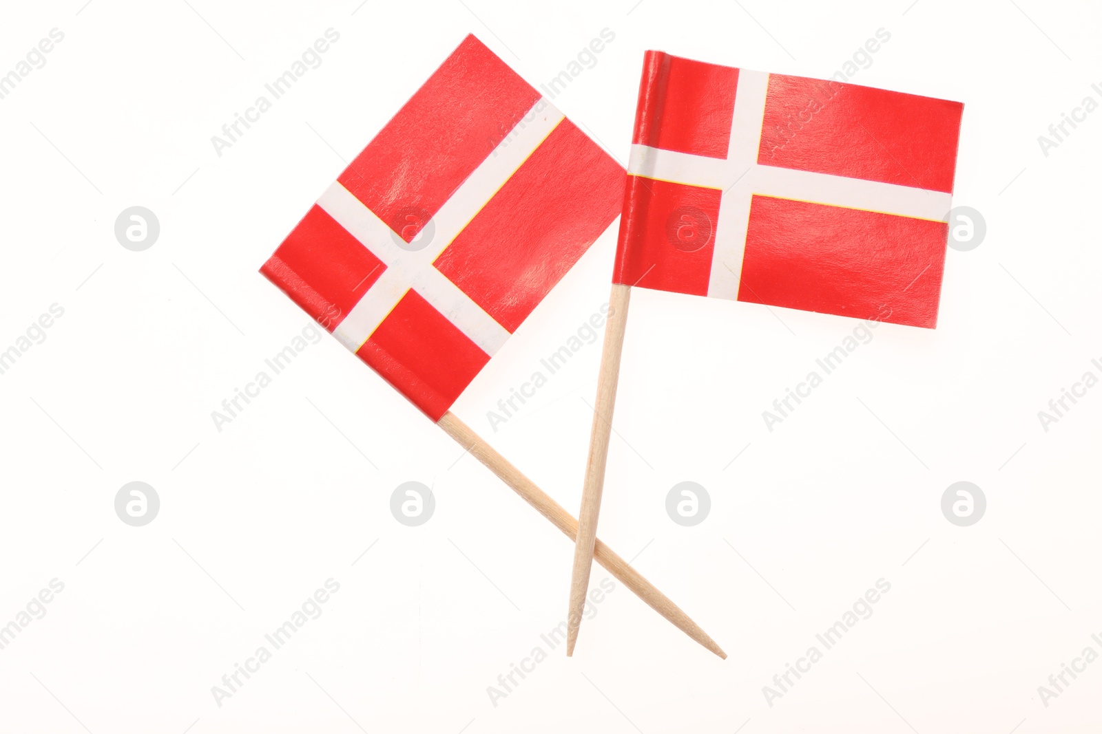 Photo of Small paper flags of Denmark isolated on white