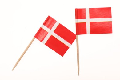 Photo of Small paper flags of Denmark isolated on white