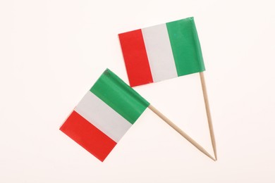 Small paper flags of Italy isolated on white