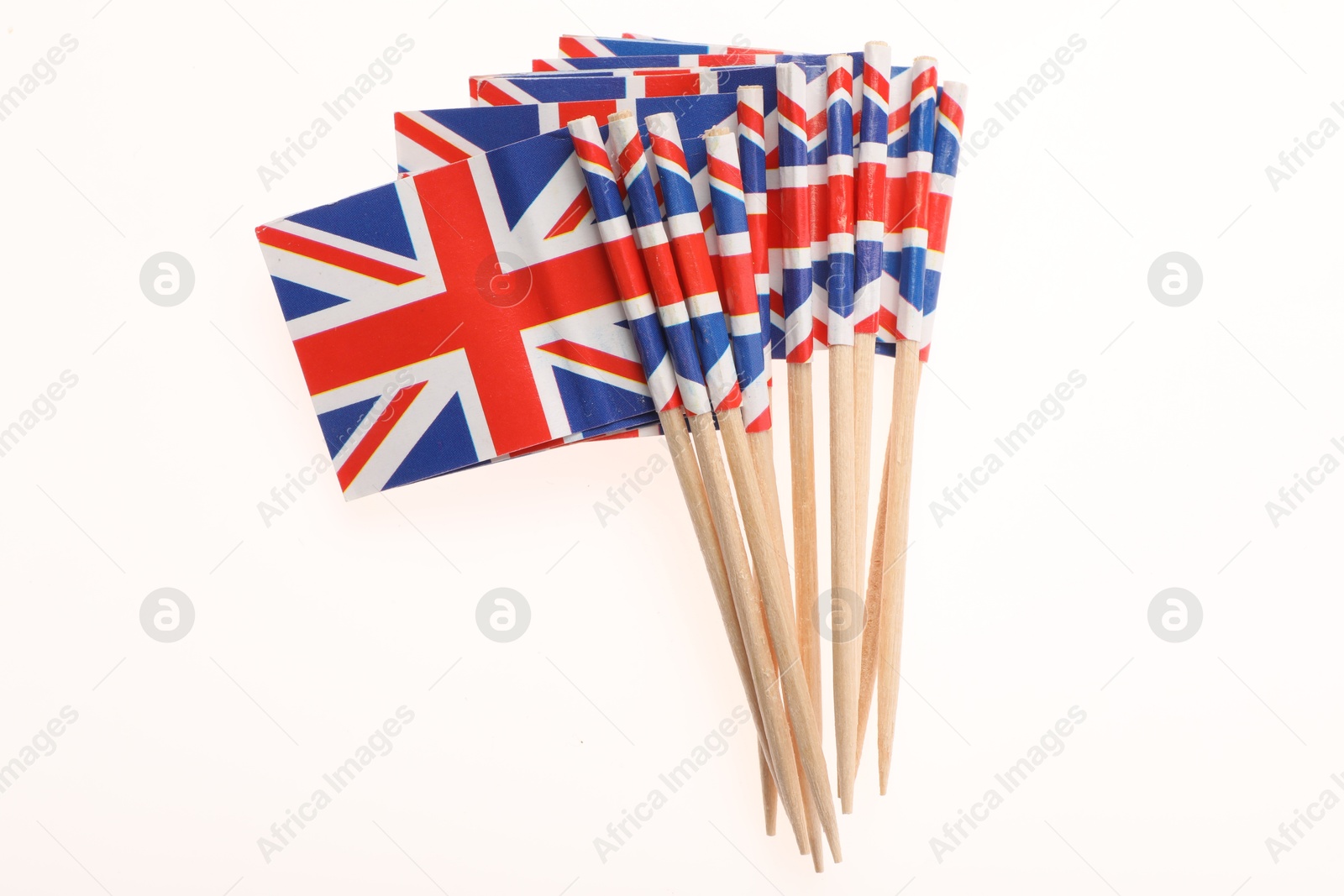 Photo of Small paper flags of United Kingdom isolated on white