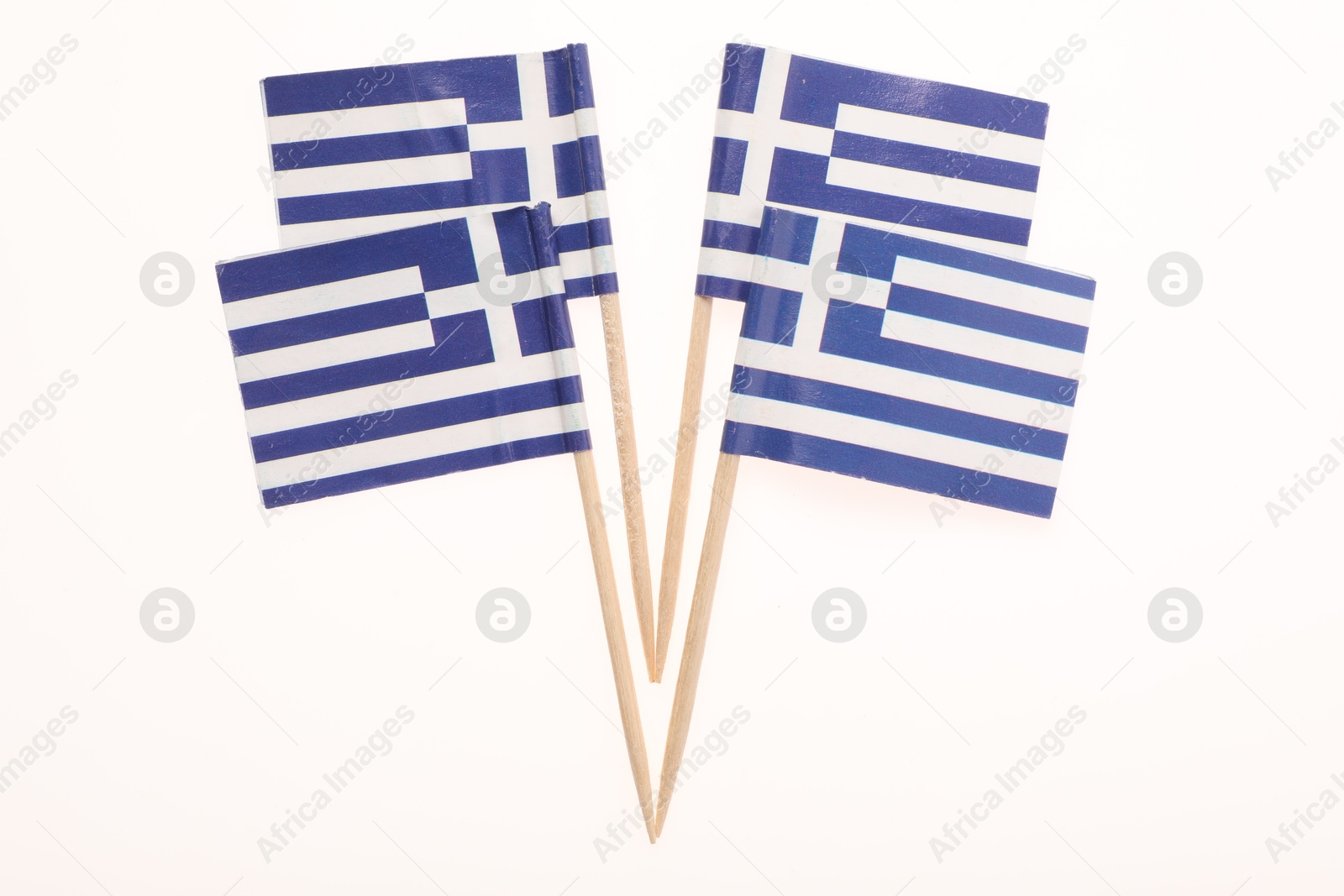 Photo of Small paper flags of Greece isolated on white