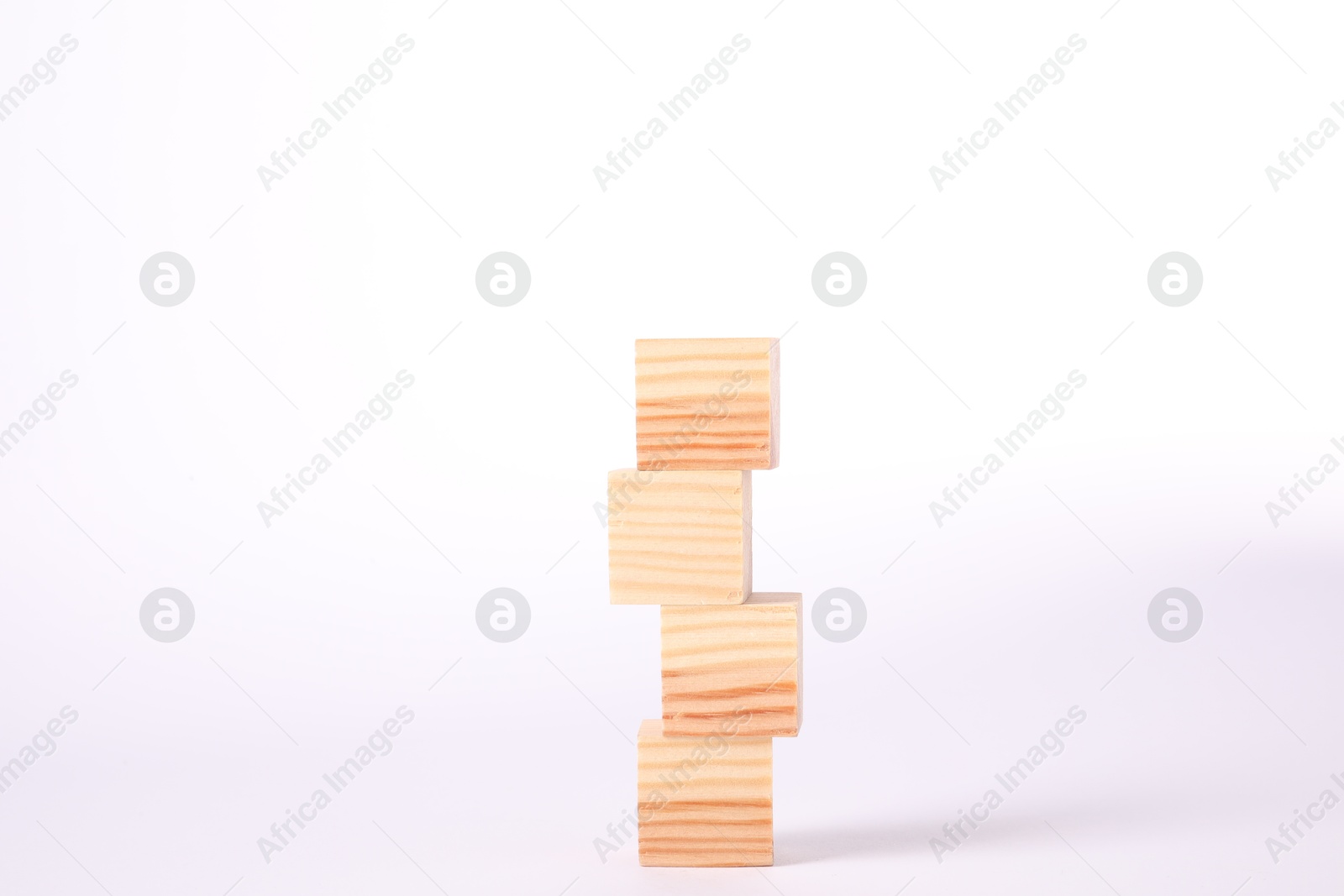 Photo of Stack of blank wooden cubes isolated on white