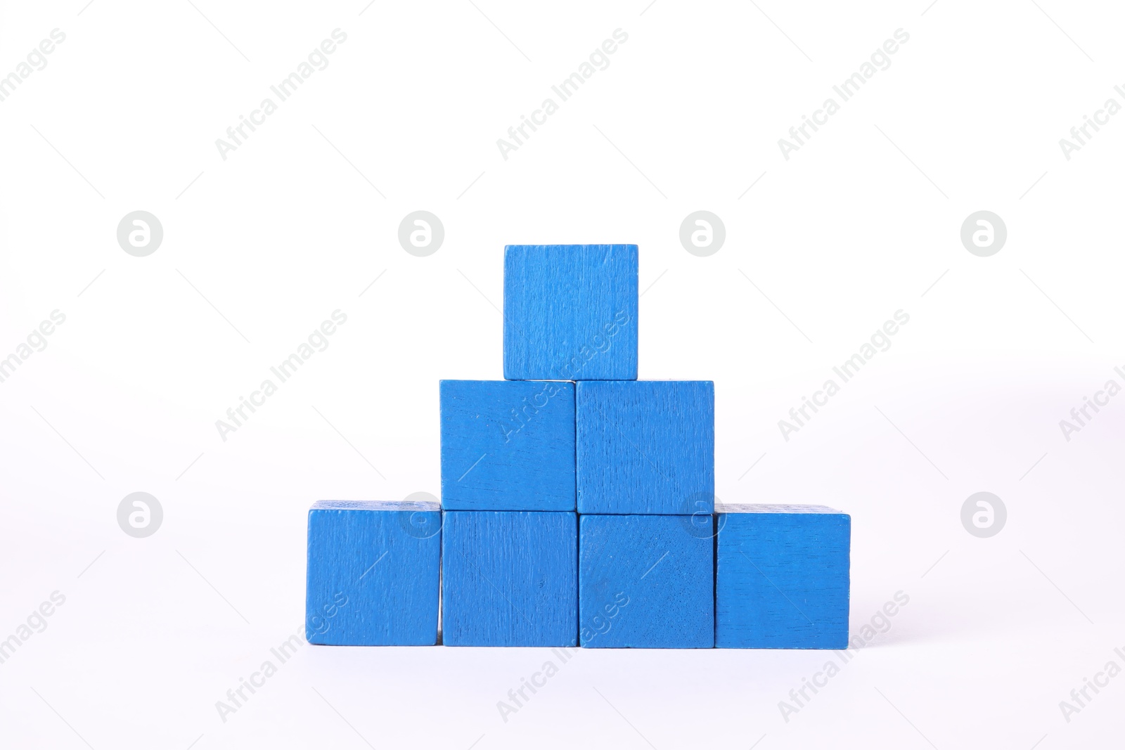 Photo of Many blue wooden cubes isolated on white