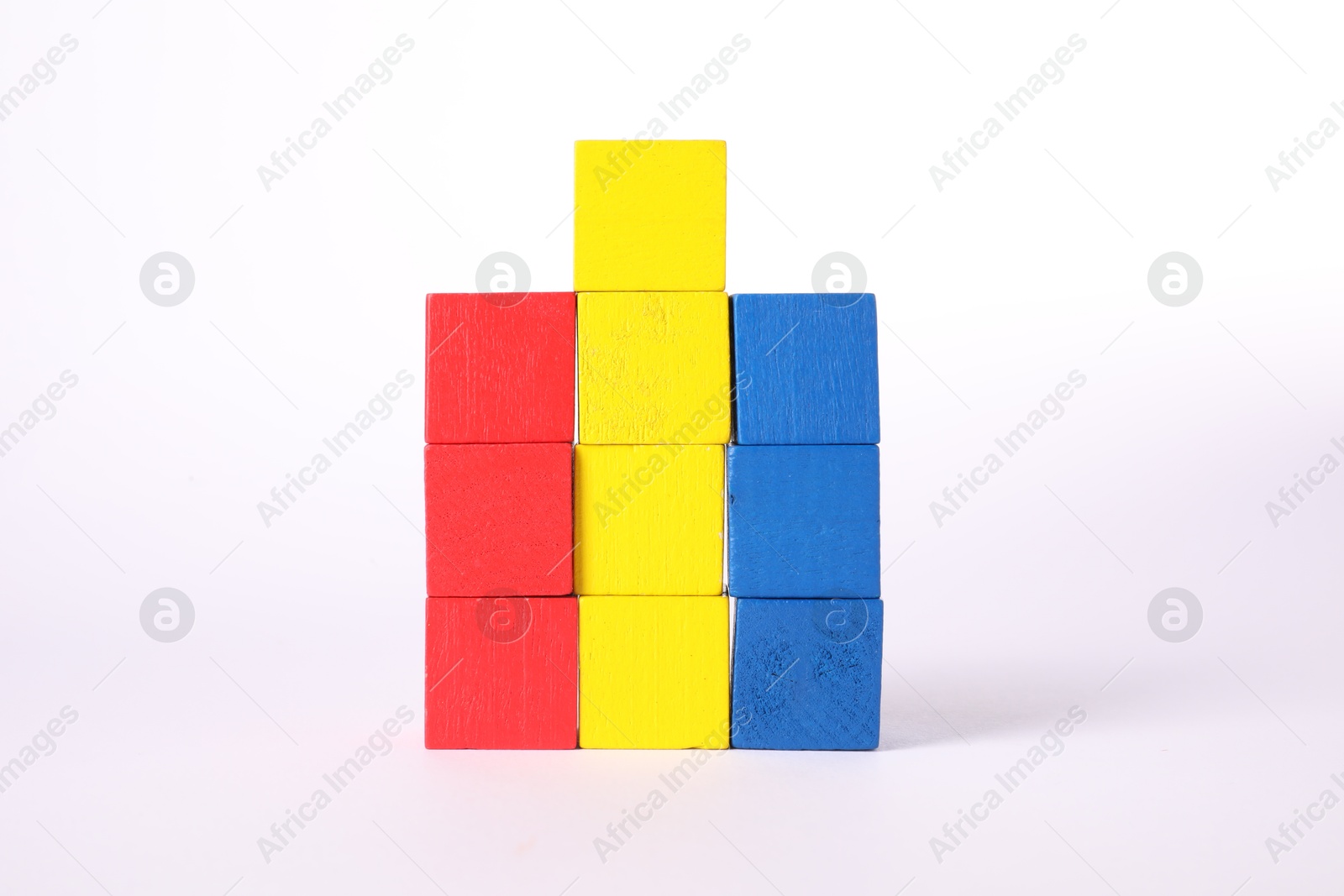 Photo of Many colorful wooden cubes isolated on white